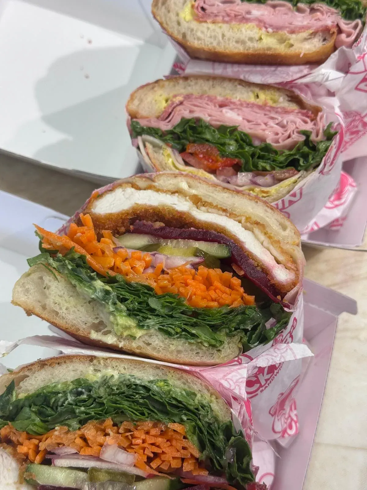 Stacked deli sandwiches